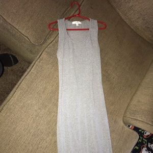 Grey dress, fits to body figure